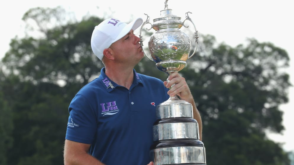 Graeme Storm - kisses the trophy after winning the BMW SA Open Championship at Glendower Golf Club