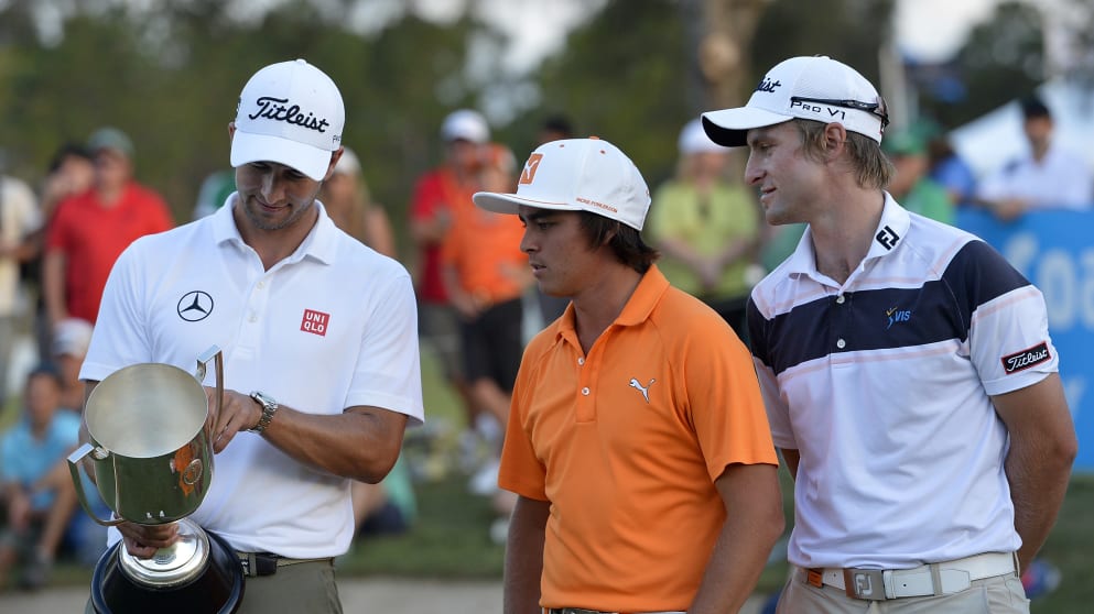 Jack Wilson at the prize giving of the Australian PGA Championship with Adam Scott (L) and Rickie Fowler (C)