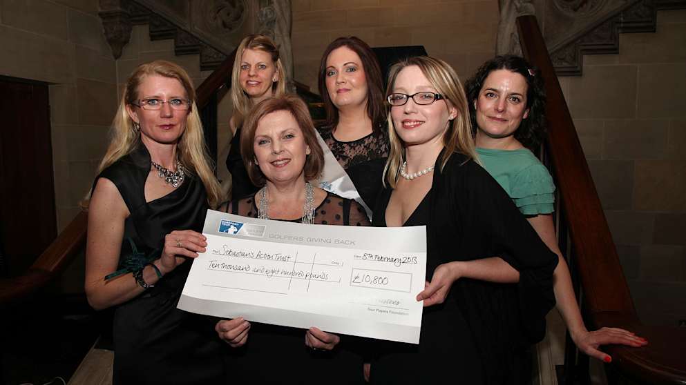 Jane Gates (centre) receives cheque for £10,800 from Marie Fasth (left) and Charlotte Duffain (right) of the TPF. Also in the photo are (back row from left) Caroline Holton, Lauren Walters and Robyn Harvey from Sebastian’s Action Trust.