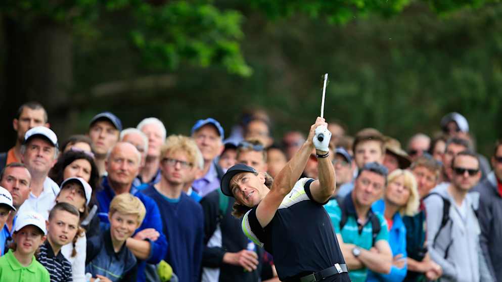 Tommy Fleetwood  hits his 2nd shot on the 9th hole