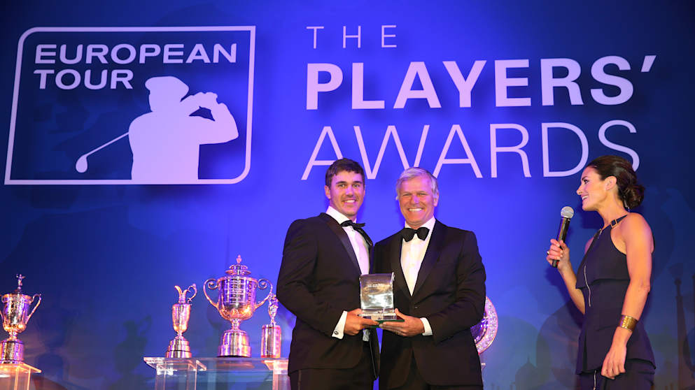 Brooks Koepka (L) of the USA receives the Challenge Tour Graduate of the Year award from Alain De Soultrait (R)