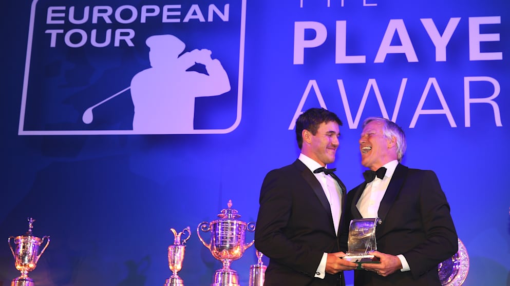 Brooks Koepka (L) receives the Challenge Tour Graduate of the Year award from Alain De Soultrait (R) the Challenge Tour Director