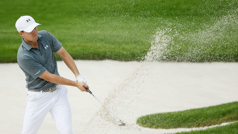 Jordan Spieth - plays a bunker shot on the second hole during the second round of the WGC - HSBC Champions
