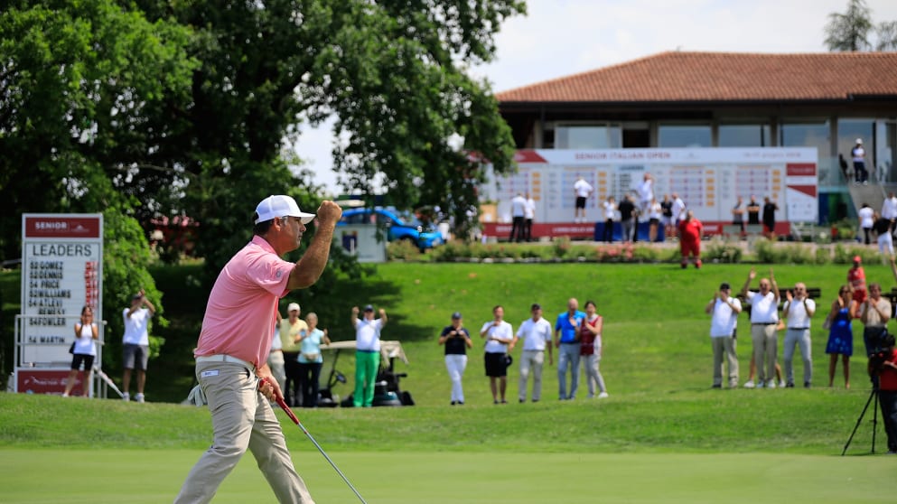 Clark Dennis celebrates his birdie putt to force a play-off