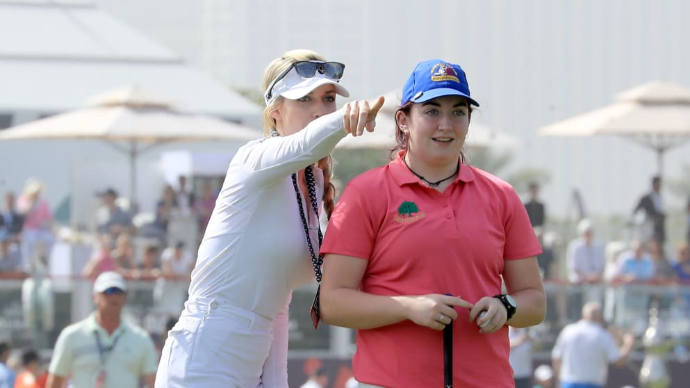 who won a global competition to play with Rory McIlroy and Niall Horan is assited by Paige Spiranac at the ODDC