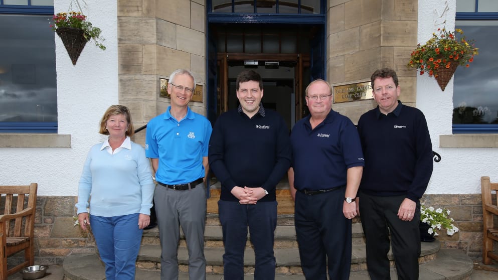 Jamie Hepburn (C) MSP, poses for a photo with Nicky Black (L), Robert Dick (2nd L), Paul Bush (2nd R) and Peter Adams (R) 