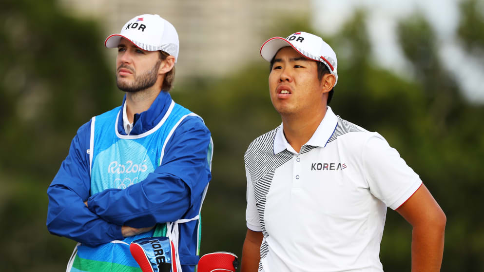 Byeong Hun An waits on the third tee