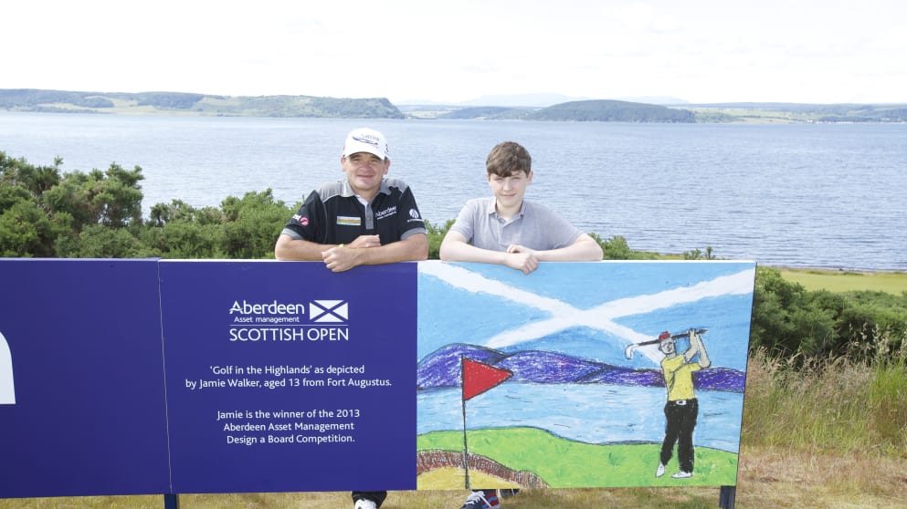 Paul Lawrie with Design a Board competition winner Jamie Walker