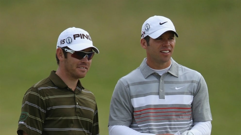 Louis Oosthuizen (L)  and Paul Casey 