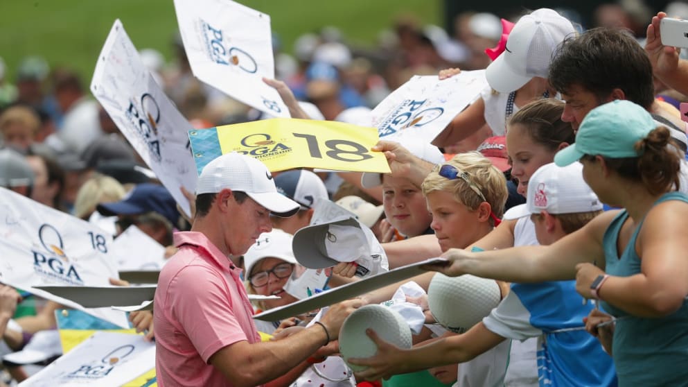 Rory McIlroy signs autographs for fans ahead of the US PGA Championship