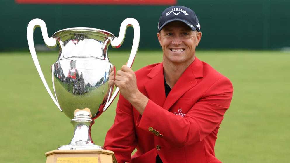 Alex Noren with the trophy folowing his victory