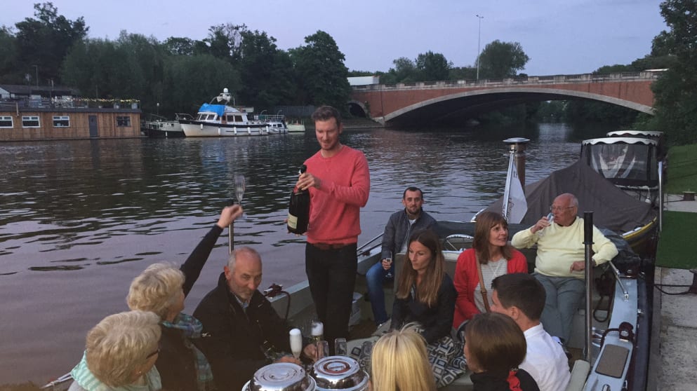 Chris Wood celebrating his BMW PGA Championship victory on a boat on the Thames