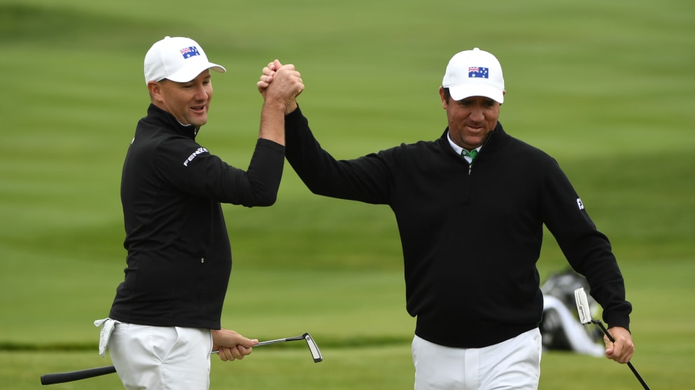 Sam Brazel and Scott Hend of Team Australia celebrate after making it into the knockout stages of the Golf Sixes