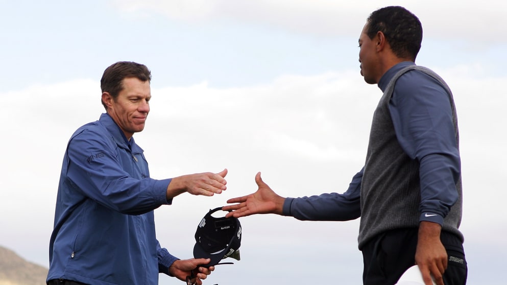Nick O'Hern shakes hands with Tiger Woods