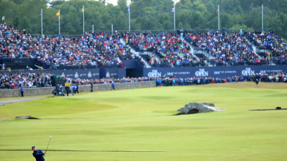 Amateur Paul Dunne plays his second shot on the 18th hole during round 3