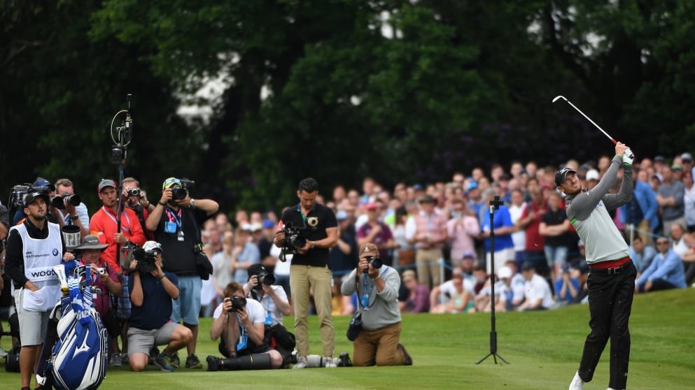 Chris Wood plays his third shot on the 18th