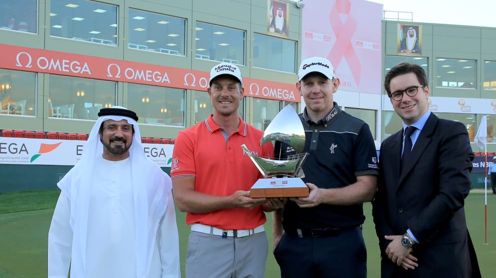 Henrik Stenson and Stephen Gallacher with Mohamed Juma Buamaim (far left), vice chairman and CEO of golf in DUBAi, and Henri Burrus (far right), areas sales manager of Omega, at Emirates Golf Club