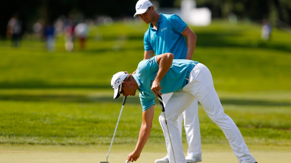 Contrasting fortunes for Henrik Stenson and Martin Kaymer on day two in Germany