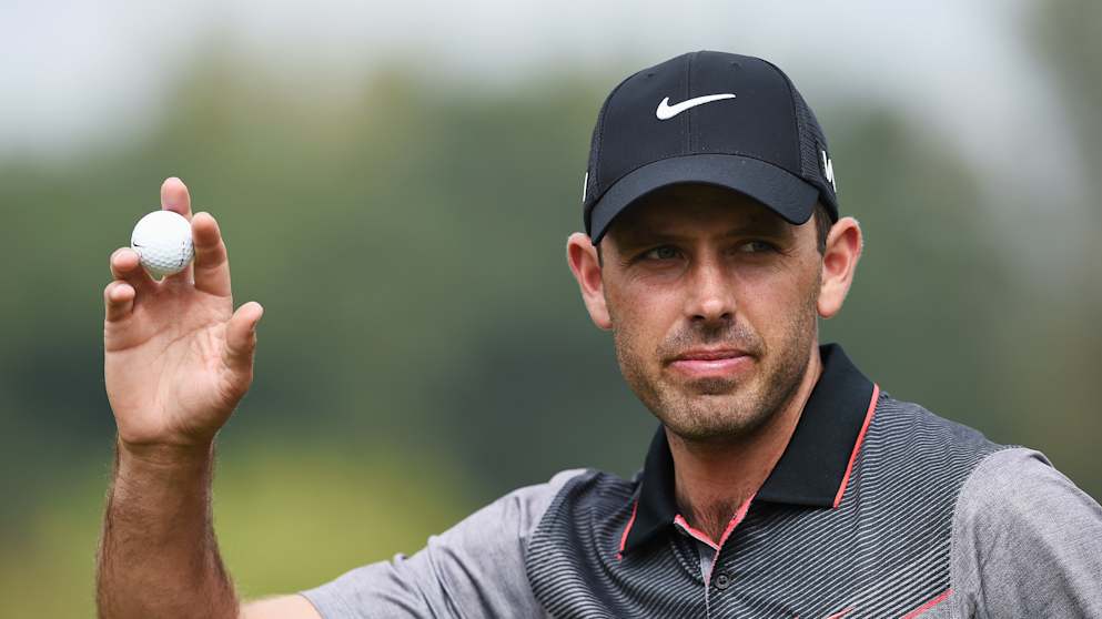 Charl Schwartzel - acknowledges the galleries after making another birdie on day two at the Porsche European Open