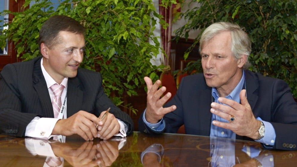 Peter Dedek (left) discusses the tournament with Challenge Tour director Alain de Soultrait