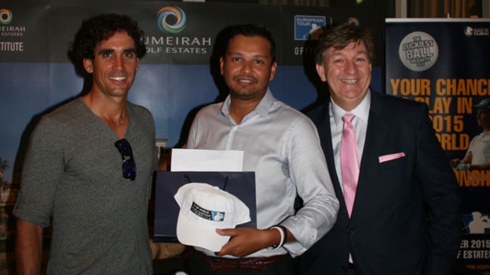 Luckiest Ball on Earth winner Jairaj Gorsia is pictured with Rafa Cabrera-Bello and Julian Small, Managing Director, Club Operations Jumeirah Golf Estates. 