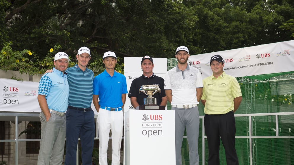 Graeme McDowell, Justin Rose, Li Hao Tong, Scott Hend, Dustin Johnson and Patrick Reed pose with the trophy at Charter Garden ahead the UBS Hong Kong Open