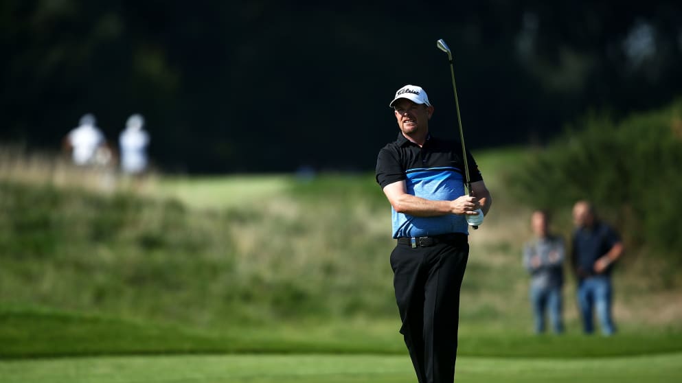 David Drysdale plays his second shot on thirteenth hole 