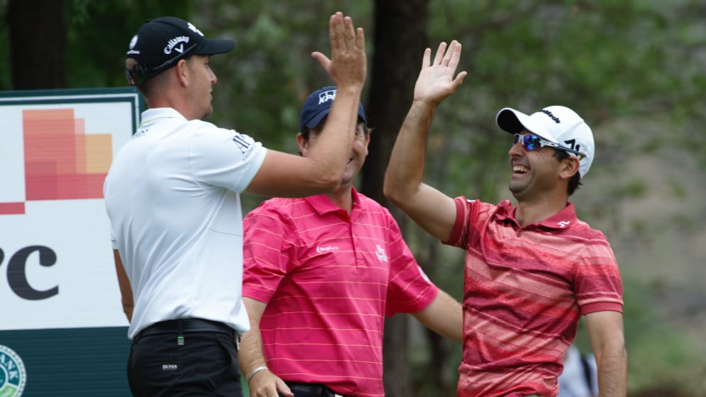 Fabrizio Zanotti - celebrates with Henrik Stenson and Thomas Aiken after making his hole-in-one at the 14th hole (pic courtesy of Jeremy Campion Photography)