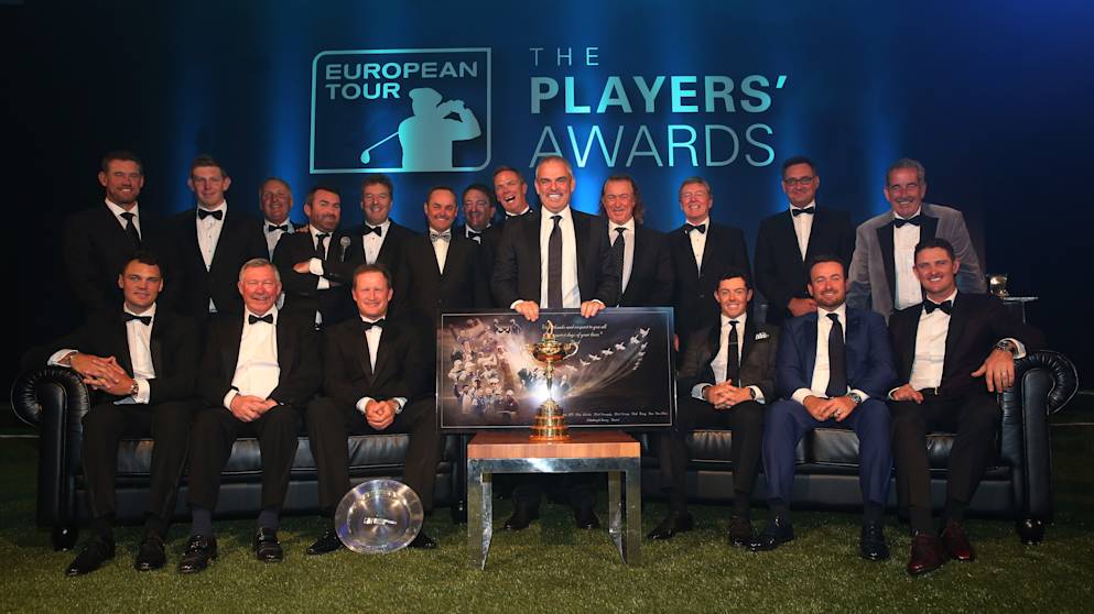 Paul McGinley poses with his gift to his European Ryder Cup side