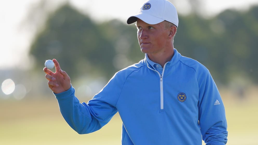 Marcus Kinhult of Sweden finishes with a birdie four at the par 5 eighteenth