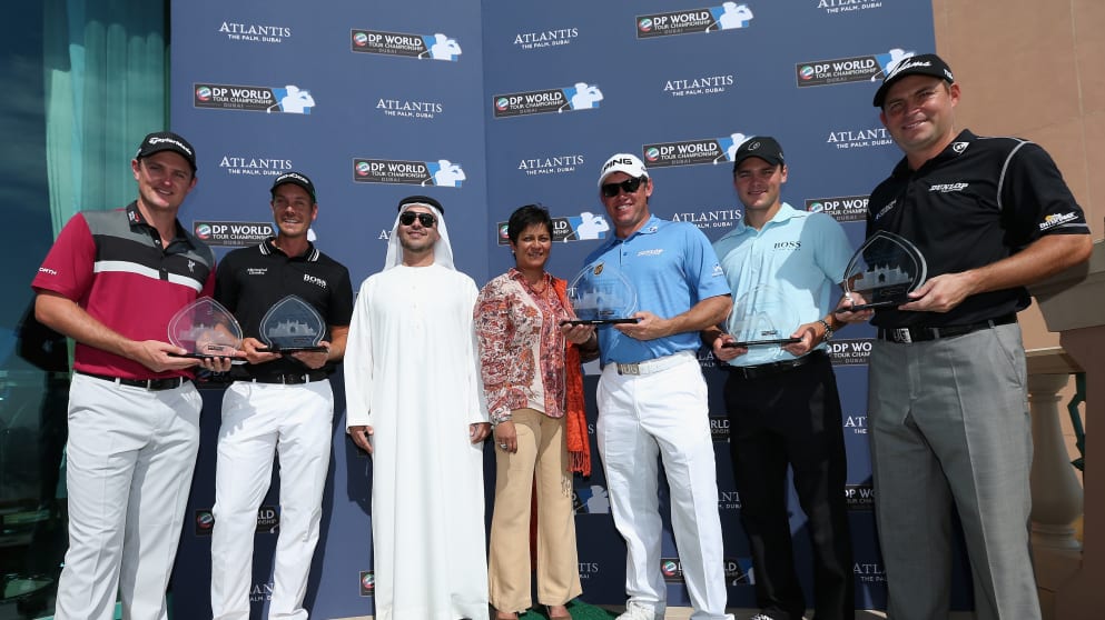 Serge Zaalof, President and Managing Director of Atlantis, The Palm presents the players with a trophy after the  DP World Tour Championship Atlantis Golf Challenge