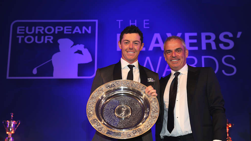 Rory McIlroy receives the Players' Player Award from Paul McGinley