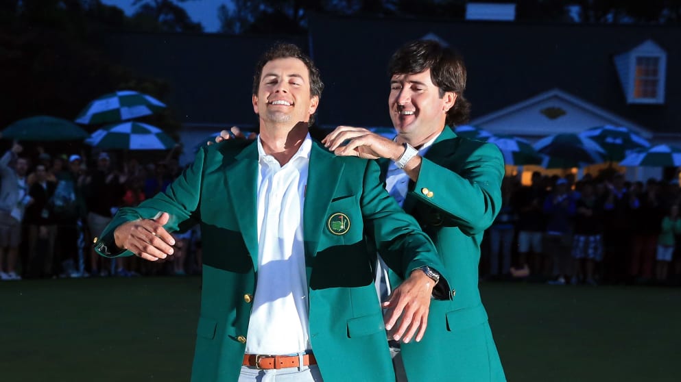 Adam Scott receives the Green Jacket from 2012 Champion Bubba Watson