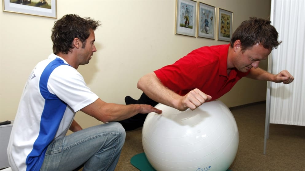 Soren Juul works on core strength in the medical facility