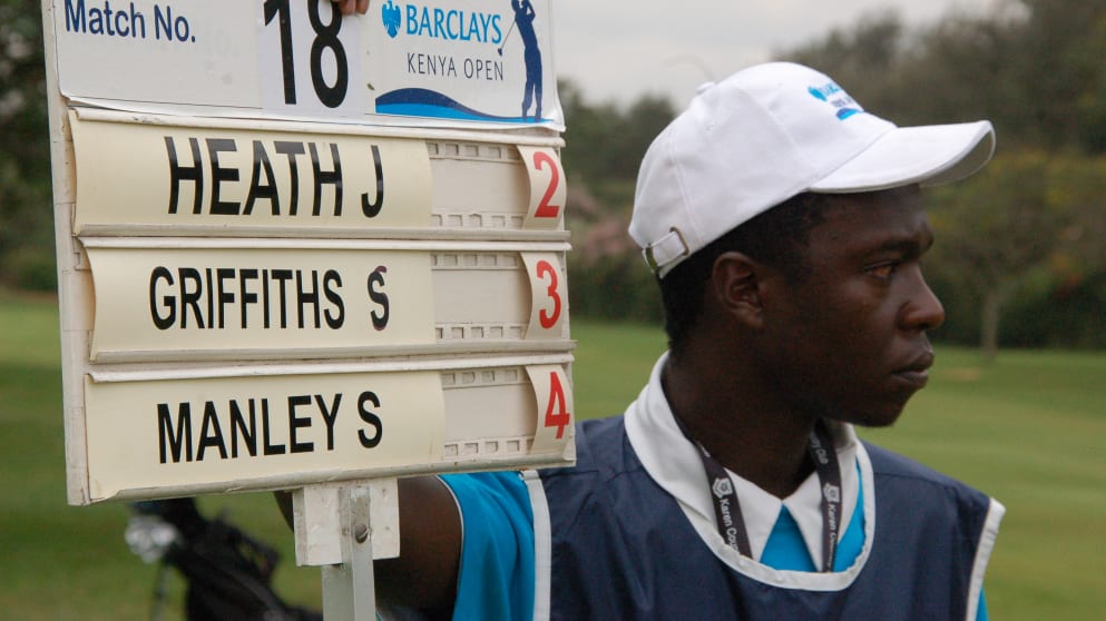 A local scoring volunteer helps out at the Barclays Kenya Open