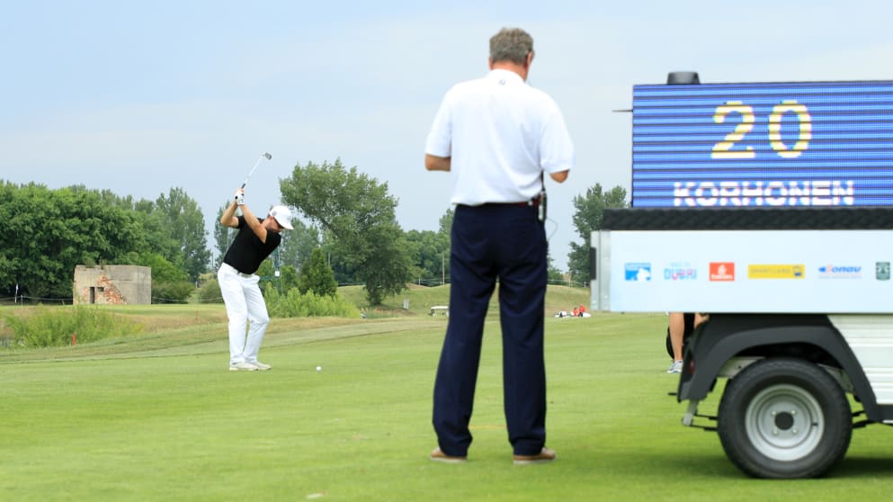 Mikko Korhonen - plays a shot at the Shot Clock Masters with the shot clock in the foreground 