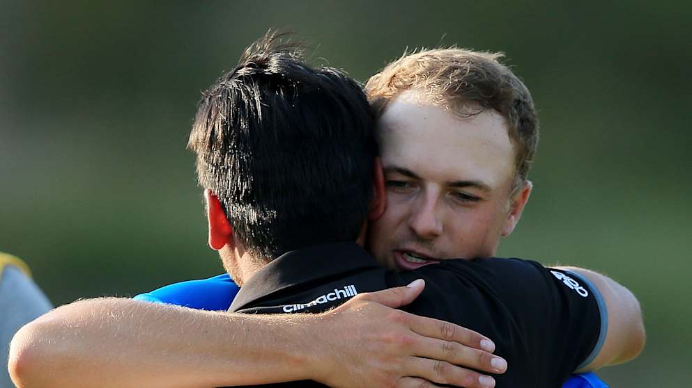 Jordan Spieth congratulates Jason Day after the Australian sealed a three-stroke victory at the 2015 US PGA Championship