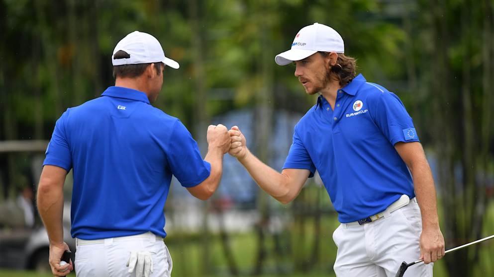 Tommy Fleetwood celebrates with Paul Casey