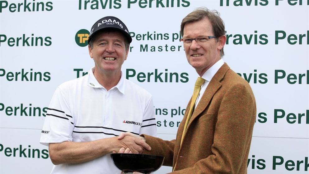 Des Smyth recieves Travis Perkins plc Senior Masters trophy