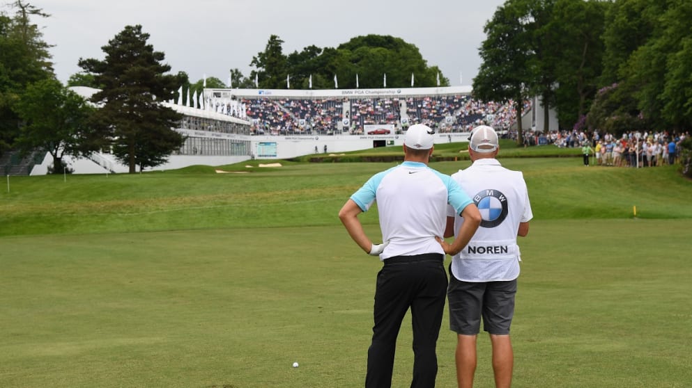 Alex Noren weighs up his approach into the 18th hole at Wentworth