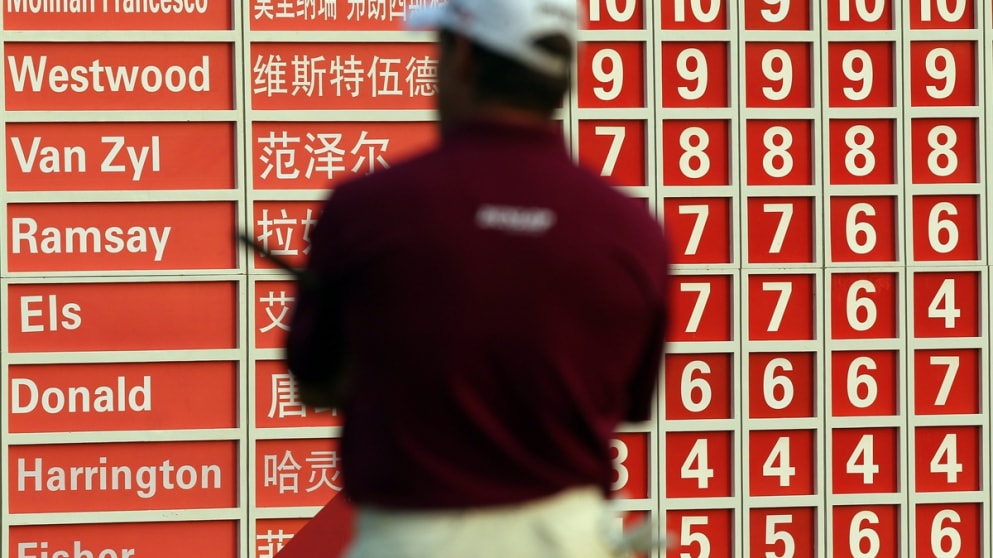 Lee Westwood sudies the leaderboard