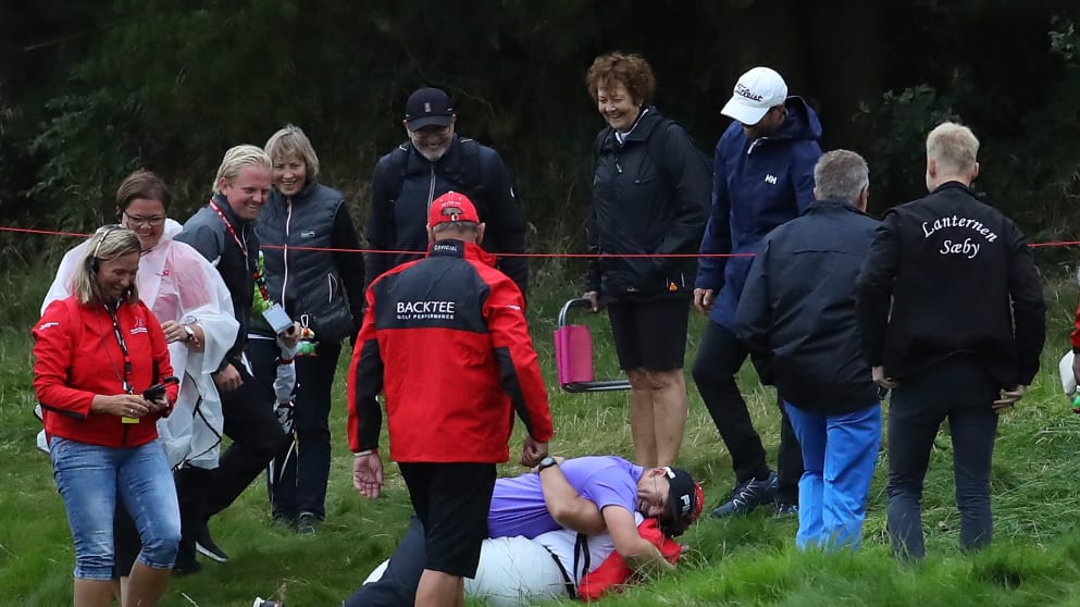 Matt Wallace hugs a marshal in Denmark