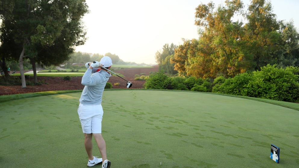 Rory McIlroy - tees off on the second hole during a pro-am round ahead of the DP World Tour Championship at Jumeirah Golf Estates