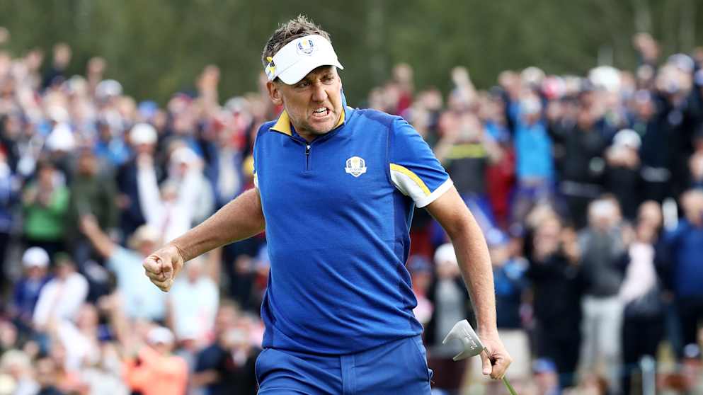  Ian Poulter celebrates winning his match on the 18th
