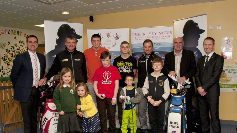 Paul Lawrie (back row, second from left) and Richie Ramsay (back row, third from right) at the announcement of ARCHIE Foundation as the official charity of the Aberdeen Asset Management Scottish Open