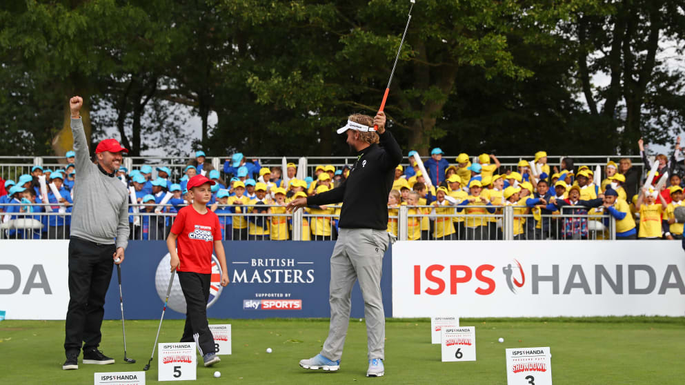 (L-R) Snooker player Stephen Hendry, Ashton Anderson and Joost Luiten celebrate winning  the ISPS Handa Pressure Putt Showdown