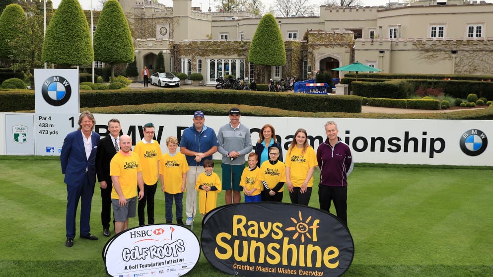 Two-time European Tour champion Anthony Wall and cricketing legend Kevin Pietersen (c) join six seriously ill children from the Rays of Sunshine charity