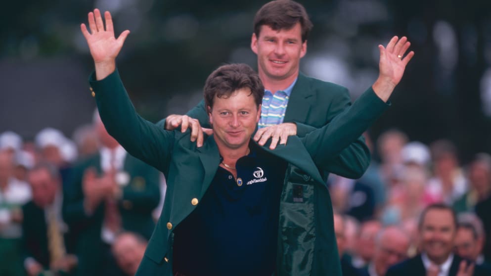 Nick Faldo gives Ian Woosnam his Green Jacket