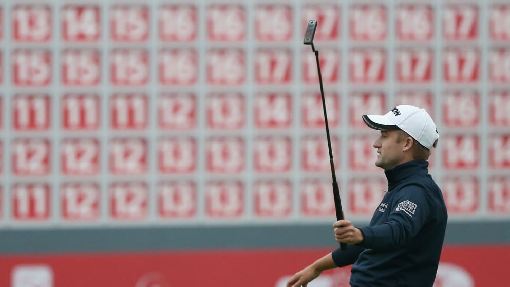 Russell Knox celebrates his two-stroke victory