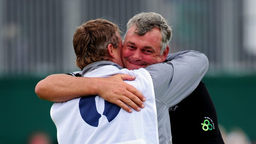 Darren Clarke embraces his caddy John Mulrooney
